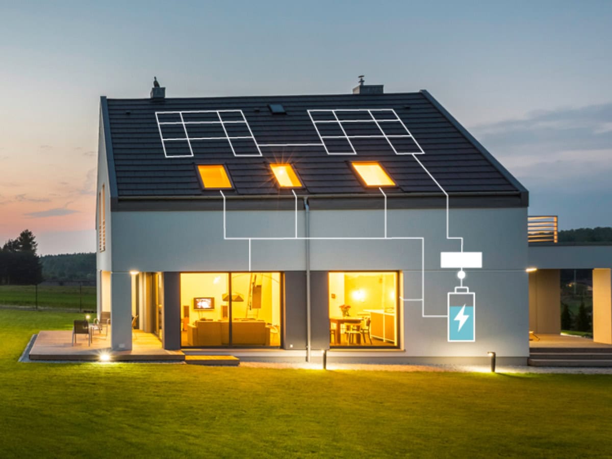 House with battery storage at night.