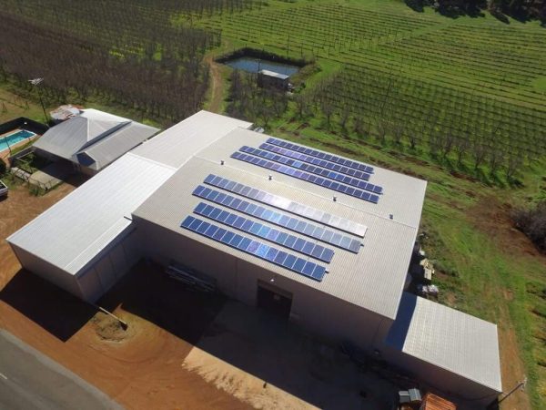 Commercial solar panels on the roof of a building in Perth, WA